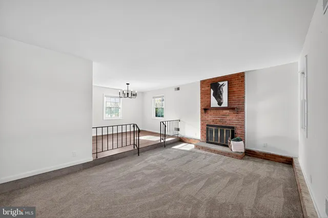 a view of livingroom with furniture and fireplace