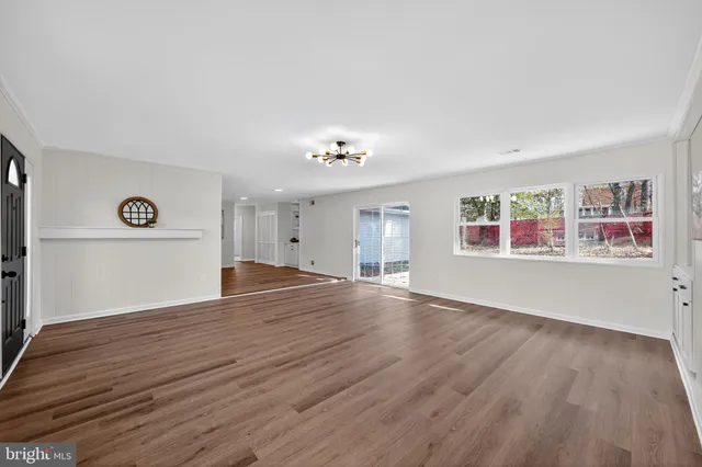 a view of a livingroom with wooden floor