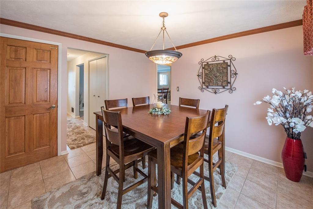 2371 Harrison City Road Export, PA 15632 - Photo 11 of 25 Formal Dining Room, Currently Used as a Breakfast Room, Situated Between the Kitchen and Family Room and also Open to the Foyer.