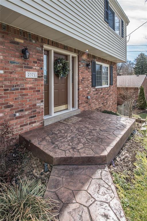 2371 Harrison City Road Export, PA 15632 - Photo 3 of 25 Beautiful Stamped Concrete Walkway leading to the front entrance.