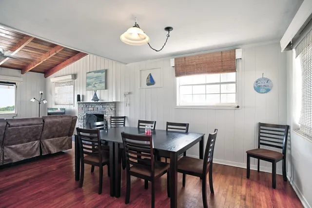 a bedroom with a bed and a table in it