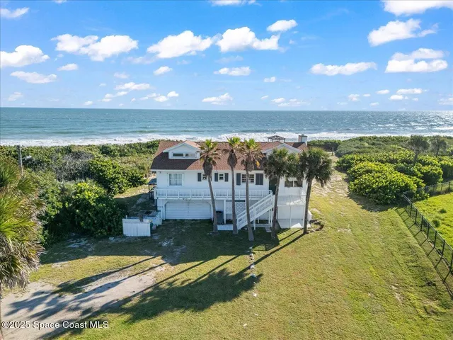 a view of a lake with a yard