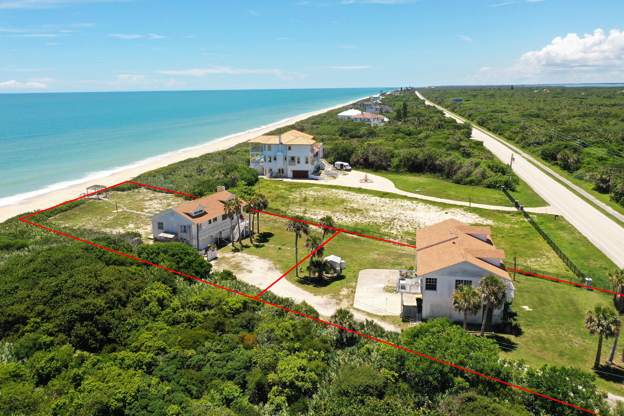 8517 Jimmy Buffett Mem Highway Melbourne Beach, FL 32951 - Photo 9 of 60 an aerial view of residential houses with outdoor space and street view