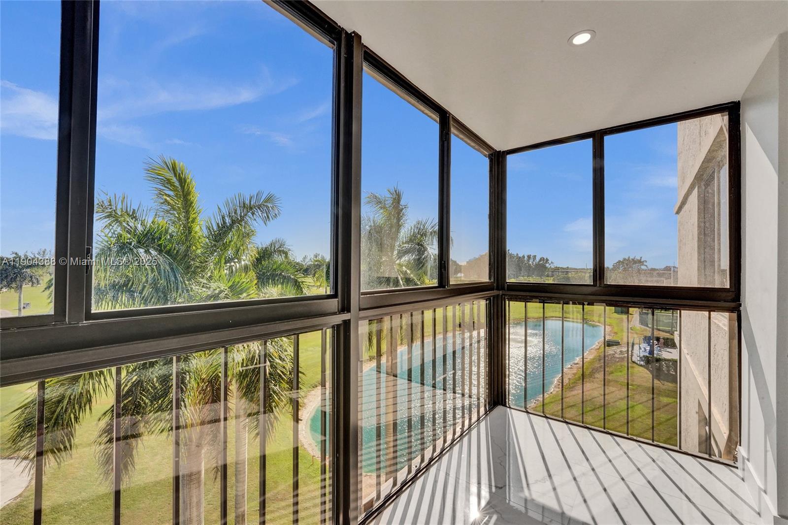 8900 Washington Street, Unit 506A Pembroke Pines, FL 33025 - Photo 11 of 28 a view of a balcony with wooden floor