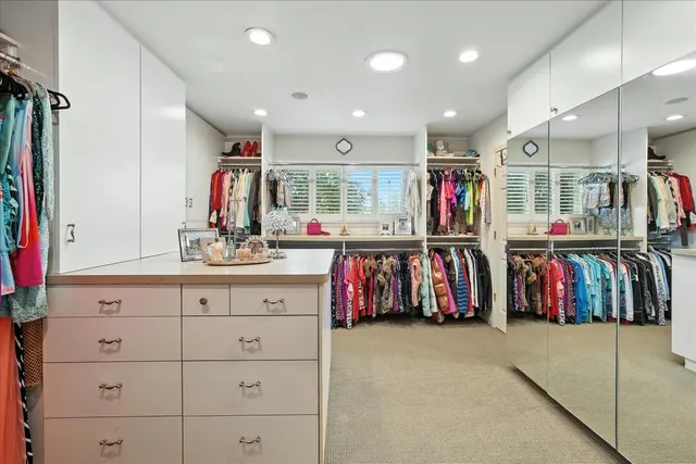 a view of a yard with a table and chairs