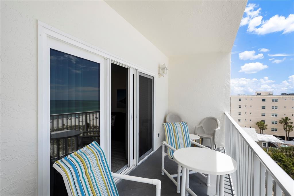 13500 Gulf Boulevard, Unit 505 Madeira Beach, FL 33708 - Photo 20 of 42 a view of a hallway with furniture and front door
