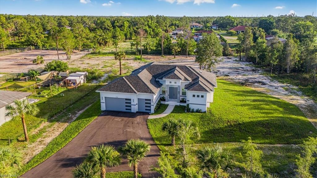 2941 37th Avenue Northeast Naples, FL 34120 - Photo 11 of 46 an aerial view of a house