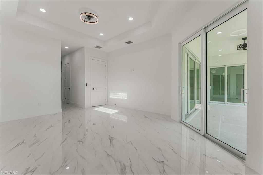 2941 37th Avenue Northeast Naples, FL 34120 - Photo 27 of 46 a view of an empty room