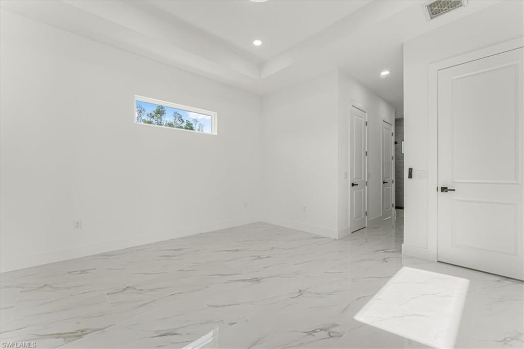 2941 37th Avenue Northeast Naples, FL 34120 - Photo 28 of 46 a view of an empty room