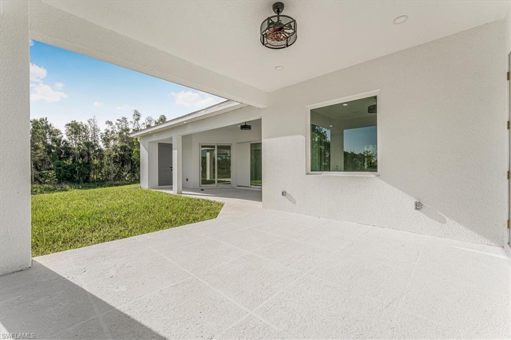 2941 37th Avenue Northeast Naples, FL 34120 - Photo 30 of 46 a view of outdoor space and yard