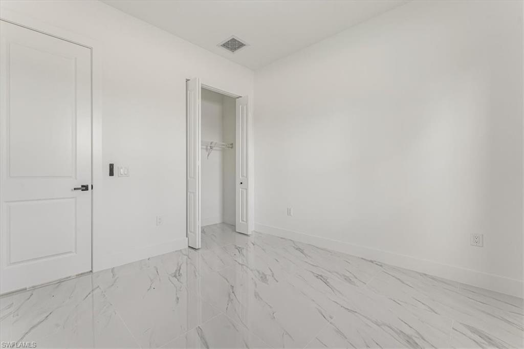 2941 37th Avenue Northeast Naples, FL 34120 - Photo 31 of 46 a view of an empty room