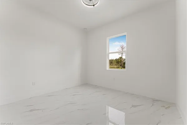 a view of a room that has a window in it