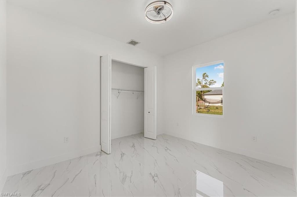 2941 37th Avenue Northeast Naples, FL 34120 - Photo 35 of 46 a view of an empty room