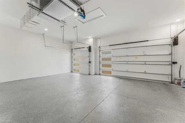 a kitchen with sink and microwave