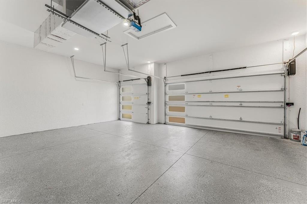2941 37th Avenue Northeast Naples, FL 34120 - Photo 37 of 46 a view of an empty room with cabinet and mirrors