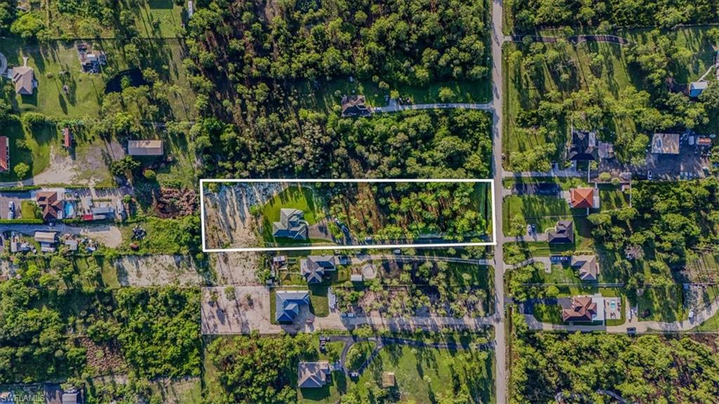 2941 37th Avenue Northeast Naples, FL 34120 - Photo 5 of 46 a view of a garden