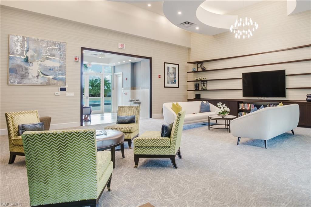 9123 Strada Place, Unit 7216 Naples, FL 34108 - Photo 25 of 28 Lobby featuring wallpapered walls, recessed lighting, and a high ceiling