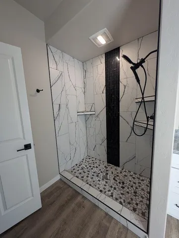 a view of entryway with wooden floor