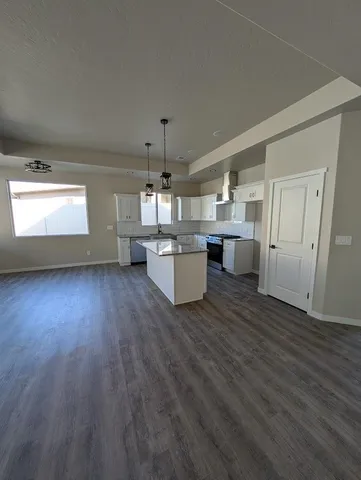a view of a kitchen and a sink