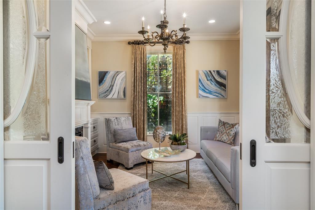 2315 Routh Street Dallas, TX 75201 - Photo 7 of 38 a living room with furniture and a chandelier