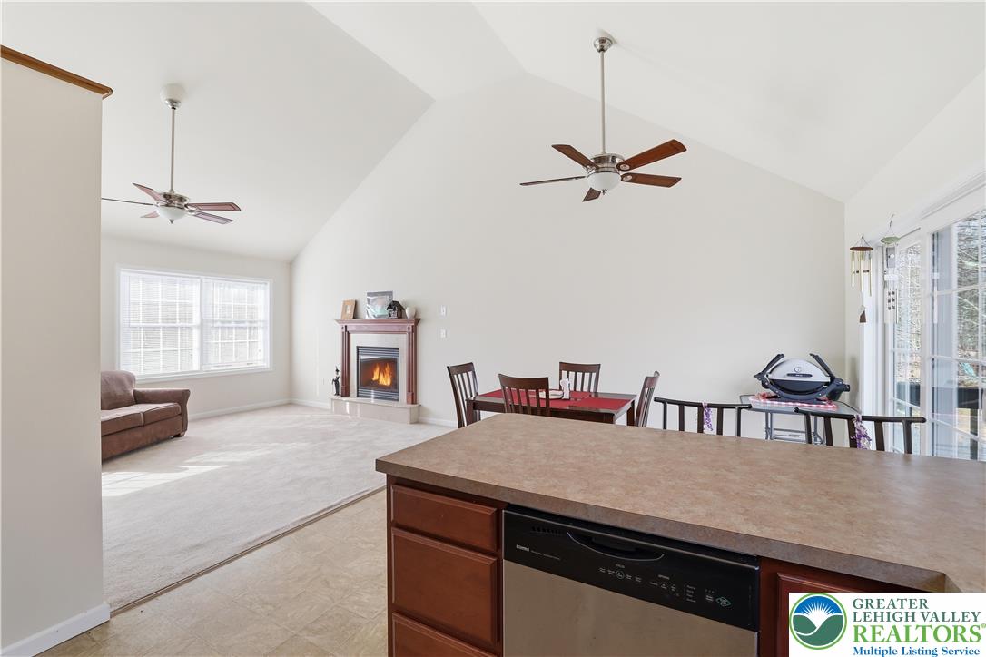 112 Amos Circle Bushkill, PA 18324 - Photo 13 of 52 a living room with furniture a window and a chandelier