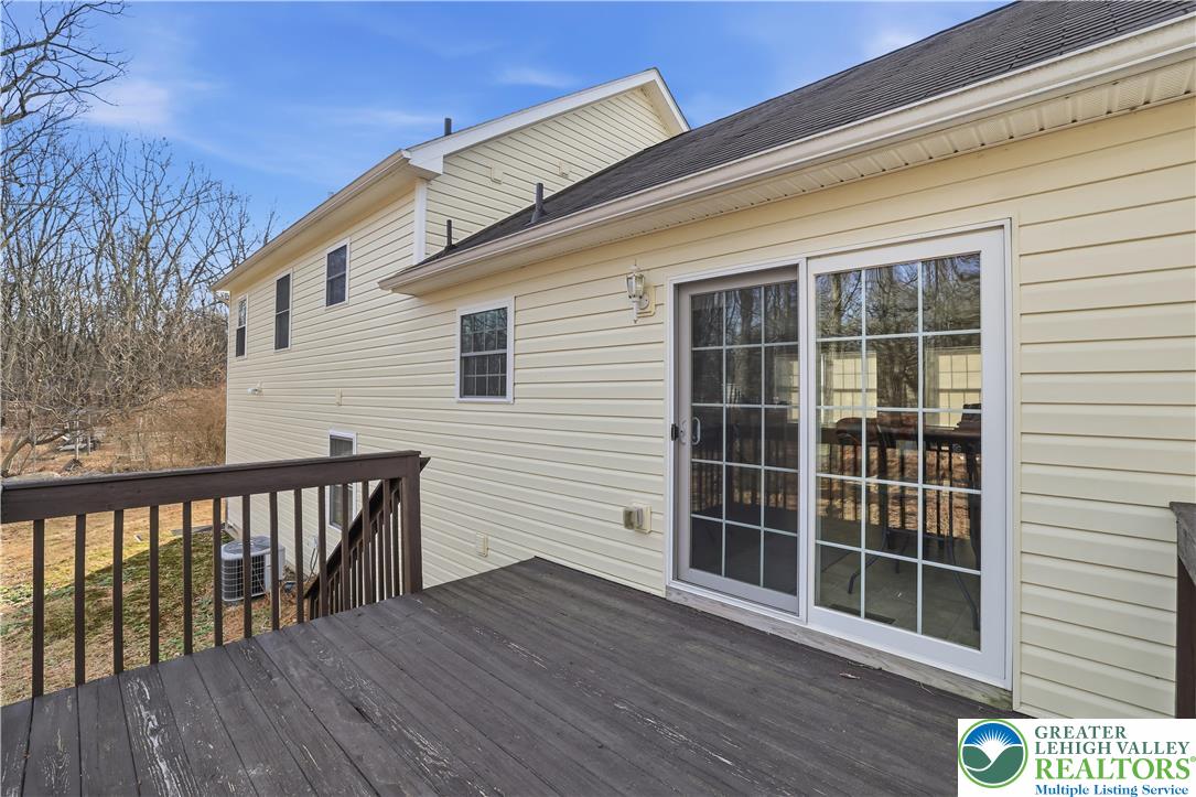 112 Amos Circle Bushkill, PA 18324 - Photo 36 of 52 a view of a deck with wooden floor and fence