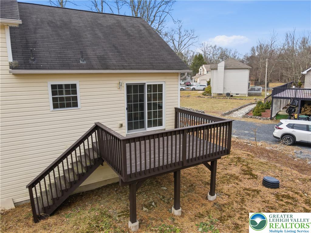 112 Amos Circle Bushkill, PA 18324 - Photo 38 of 52 a view of a roof deck with chair and wooden floor