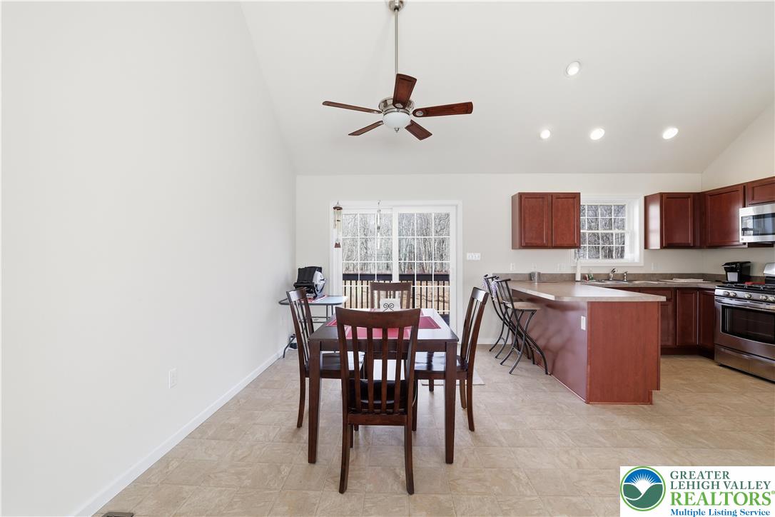 112 Amos Circle Bushkill, PA 18324 - Photo 7 of 52 a view of a dining room with furniture
