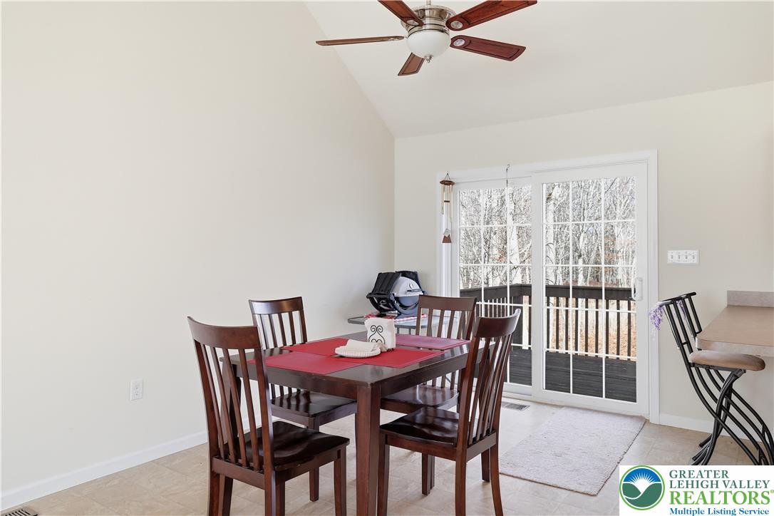 112 Amos Circle Bushkill, PA 18324 - Photo 8 of 52 a view of a dining room with furniture and a window