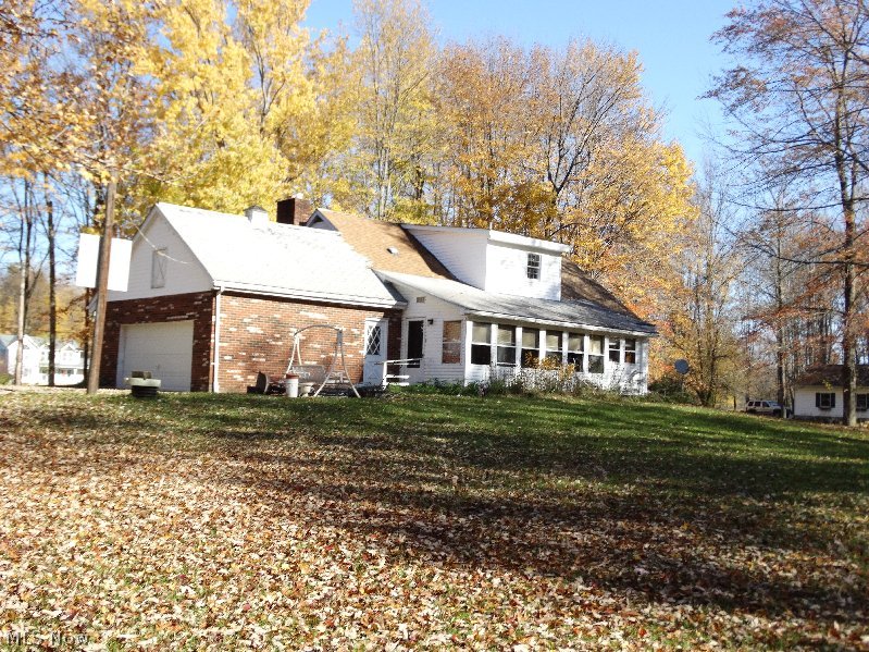 870 Webster Road Jefferson, OH 44047 - Photo 3 of 25 back of house