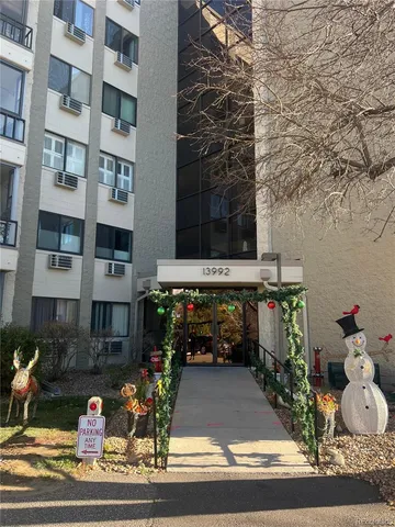 a view of a brick building with many windows