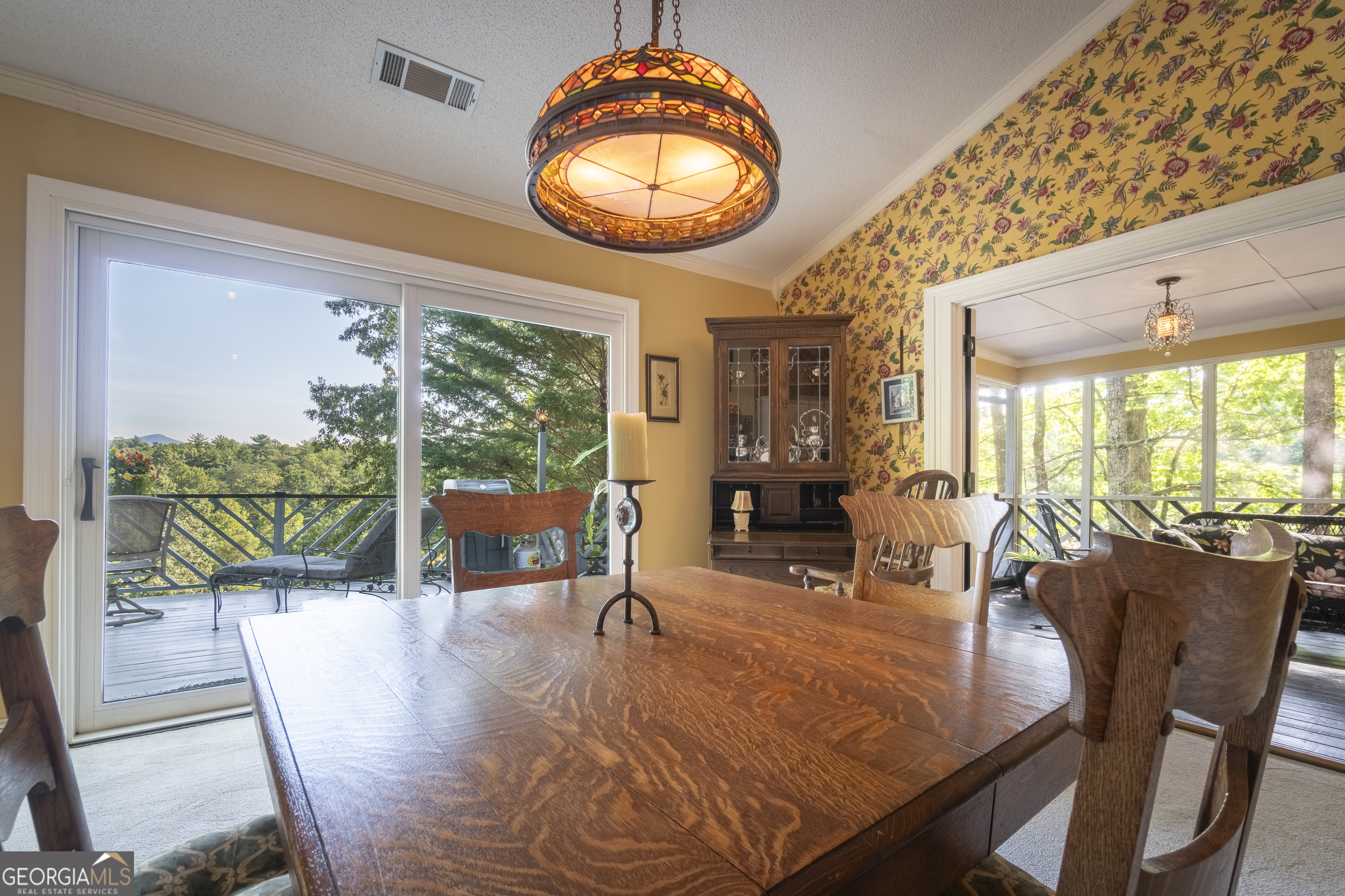 1280 Bahn Innsbruck Helen, GA 30545 - Photo 30 of 85 a view of a dining room with furniture wooden floor and chandelier