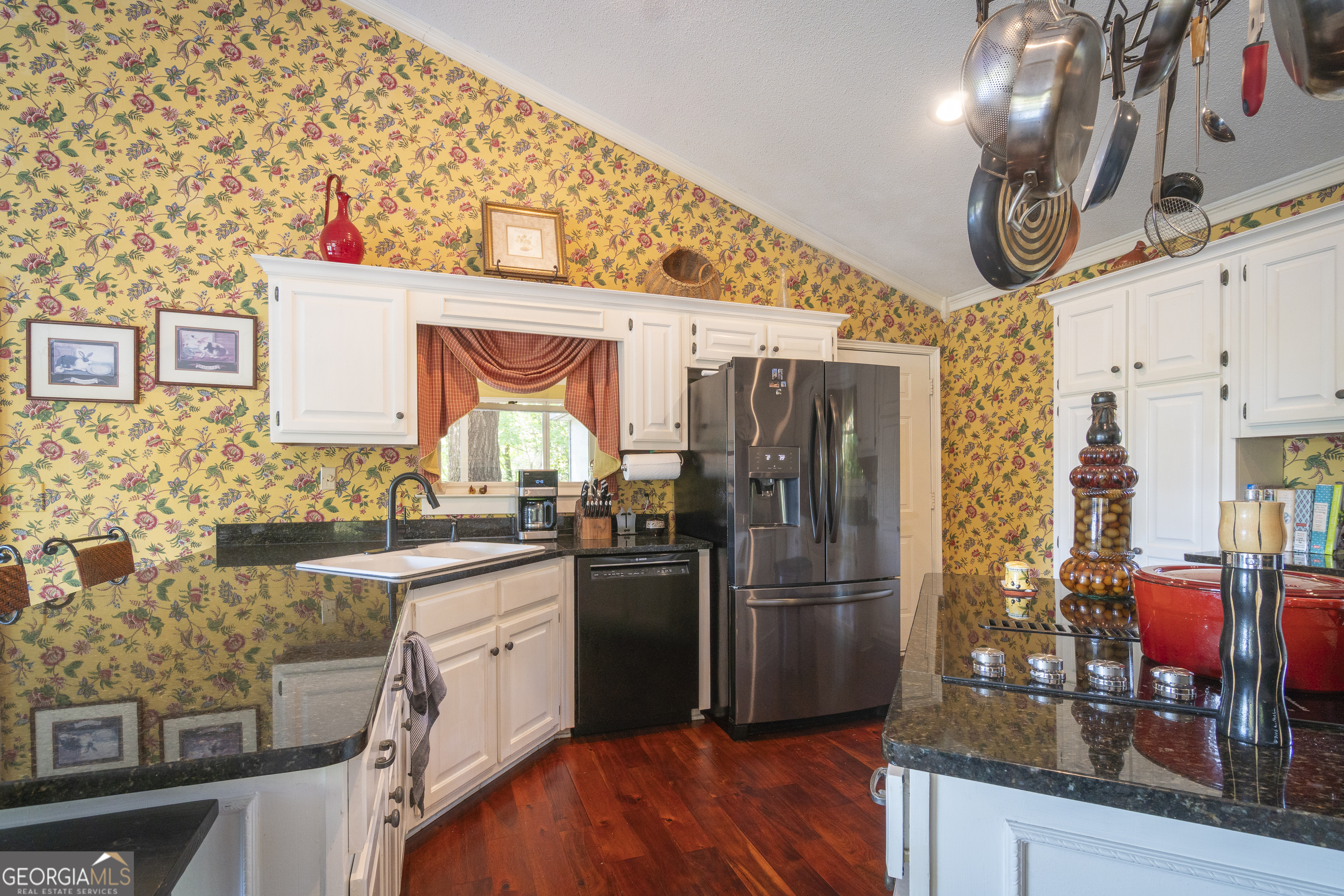 1280 Bahn Innsbruck Helen, GA 30545 - Photo 38 of 85 a kitchen with stainless steel appliances granite countertop a refrigerator and a stove