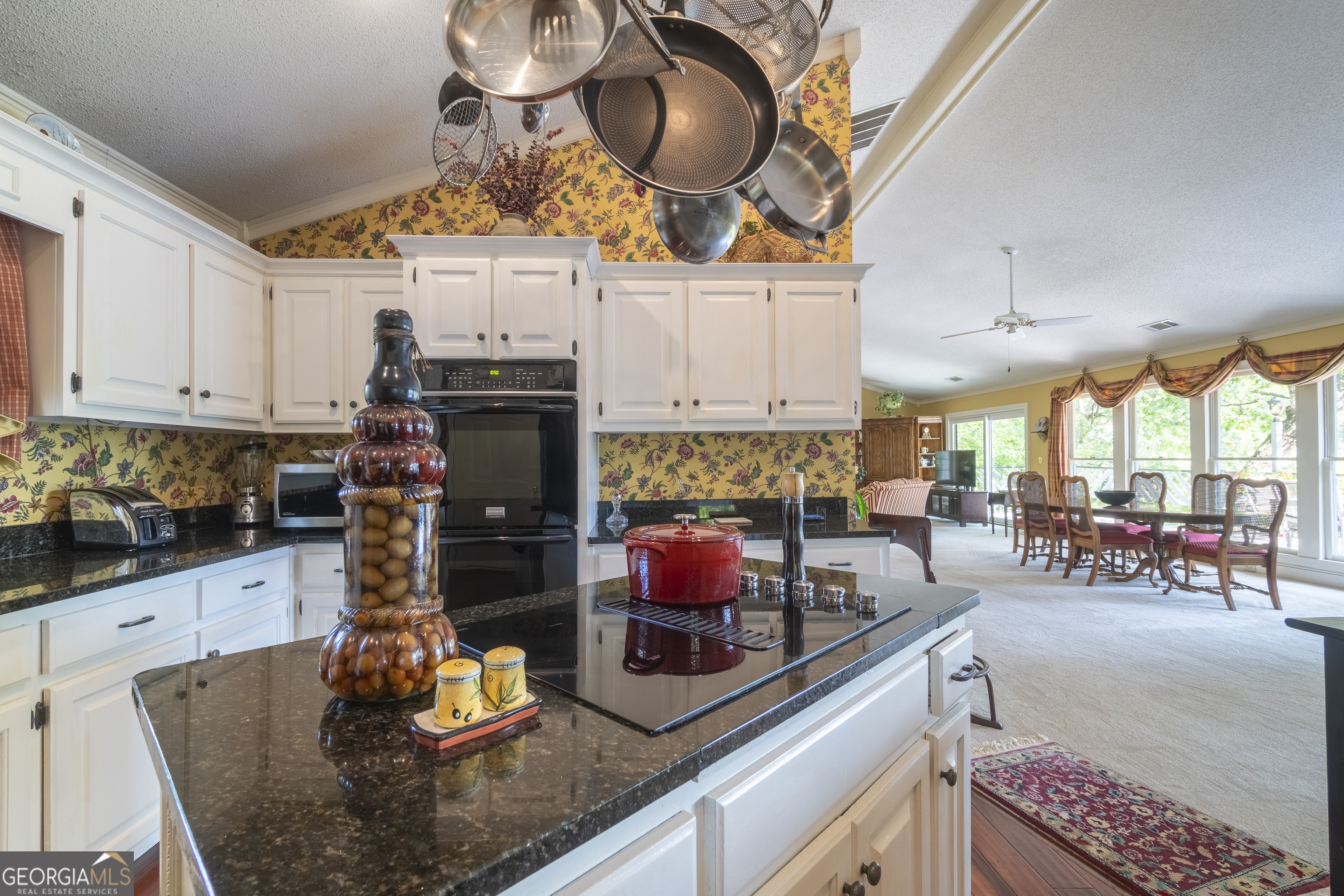 1280 Bahn Innsbruck Helen, GA 30545 - Photo 43 of 85 a kitchen with stainless steel appliances granite countertop a stove a sink and cabinets