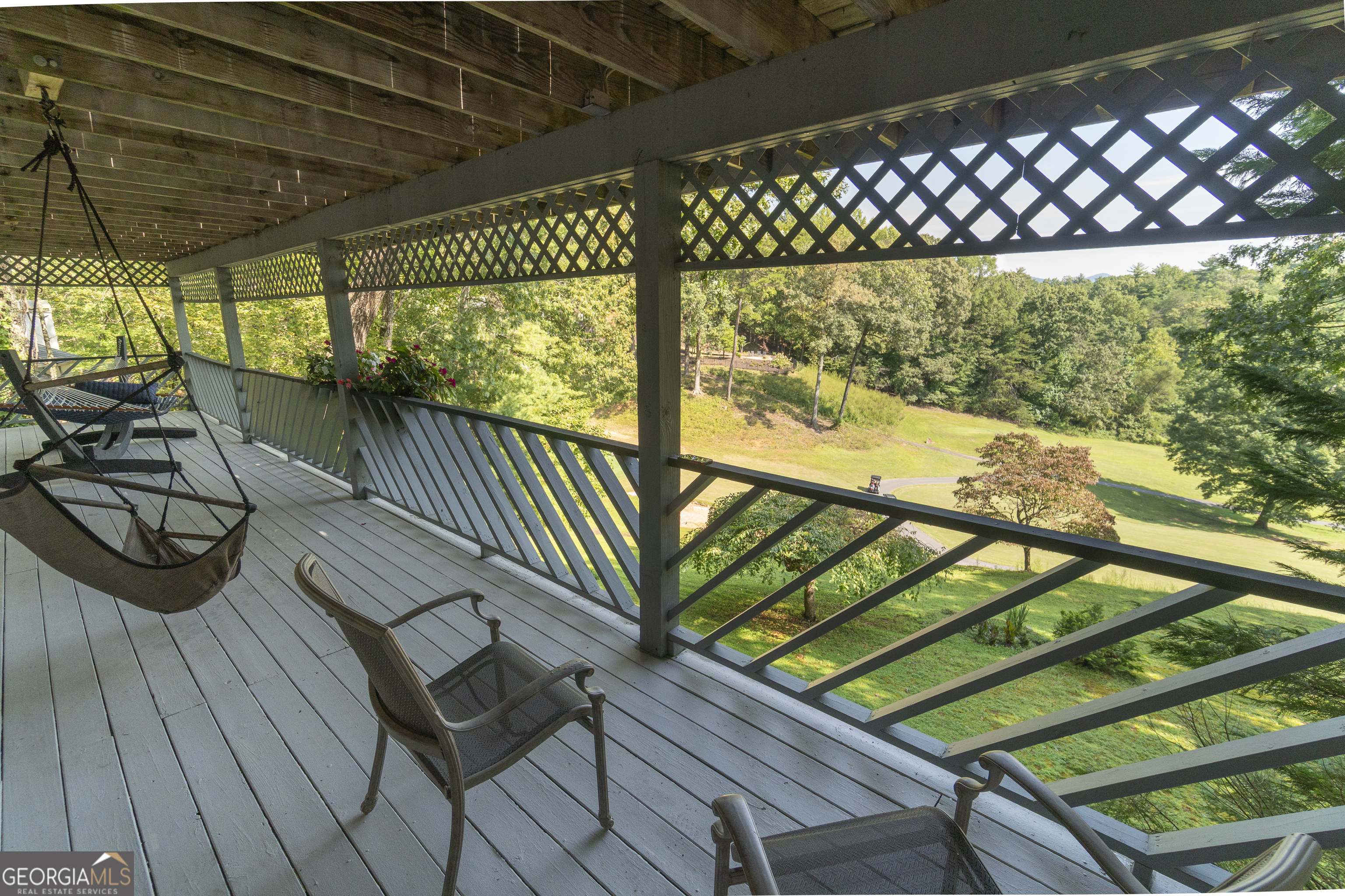 1280 Bahn Innsbruck Helen, GA 30545 - Photo 76 of 85 a view of a chairs and table on the wooden roof deck