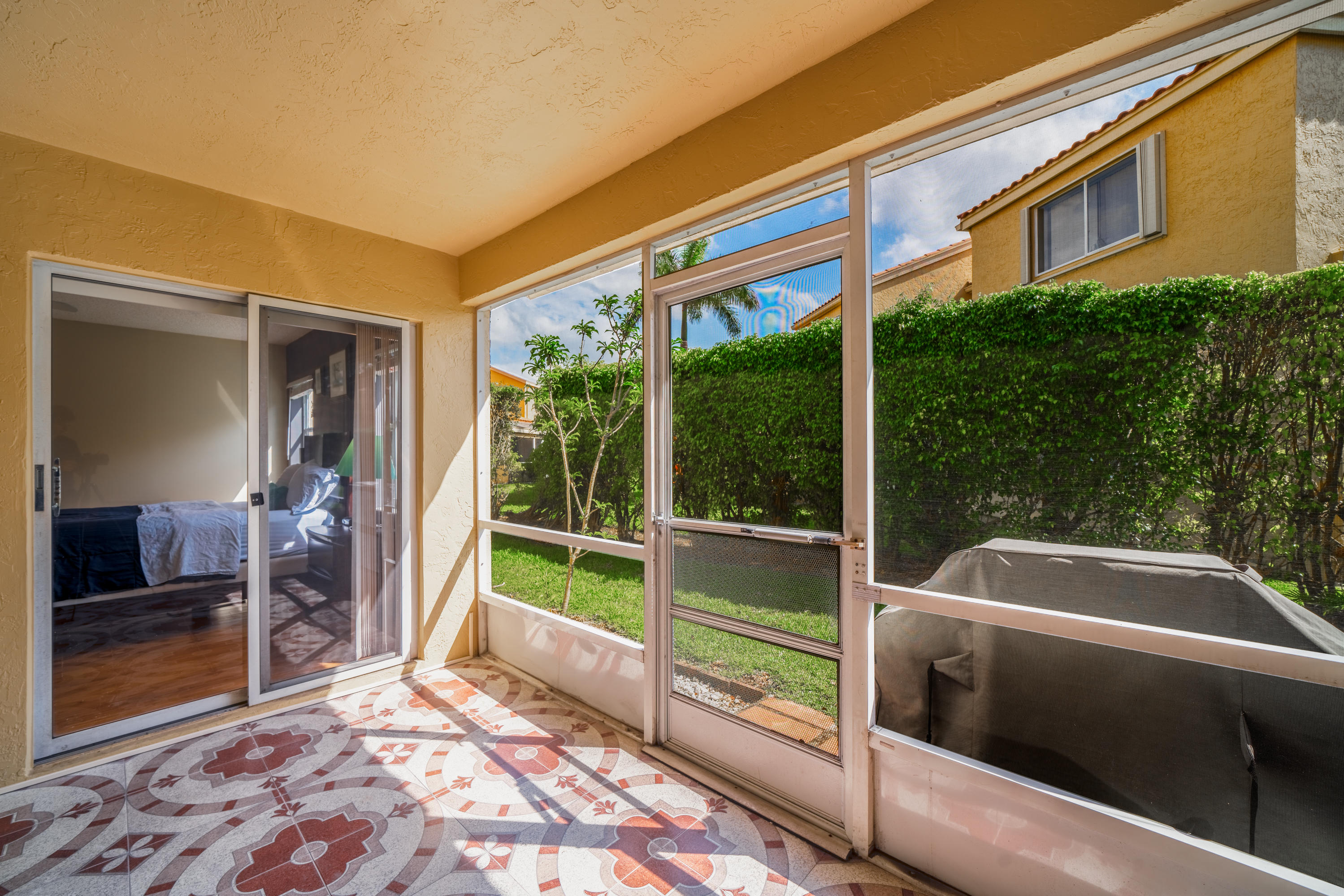 10399 Lake Vista Circle Boca Raton, FL 33498 - Photo 11 of 18 a view of backyard with tub and outdoor view