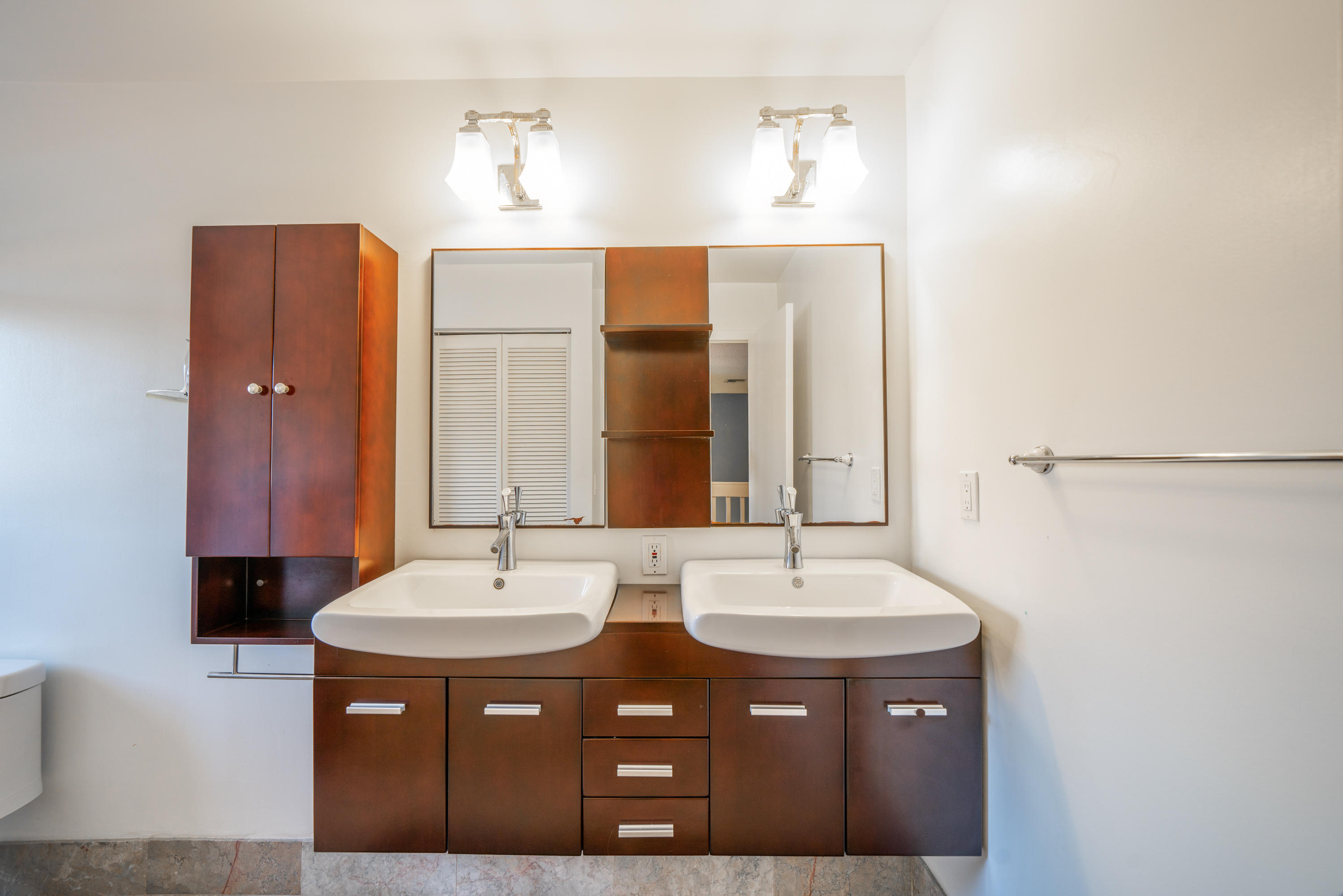 10399 Lake Vista Circle Boca Raton, FL 33498 - Photo 16 of 18 a bathroom with a sink and a mirror