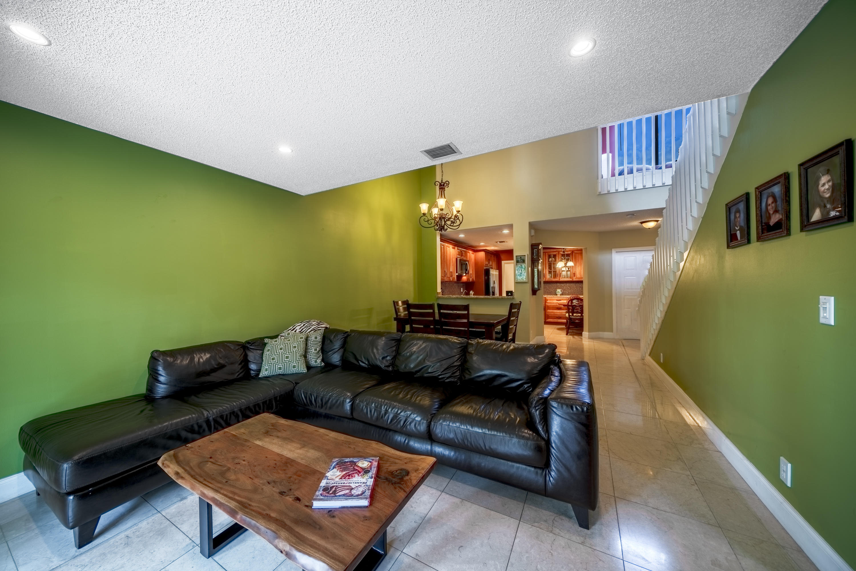 10399 Lake Vista Circle Boca Raton, FL 33498 - Photo 5 of 18 a living room with furniture and a wooden floor