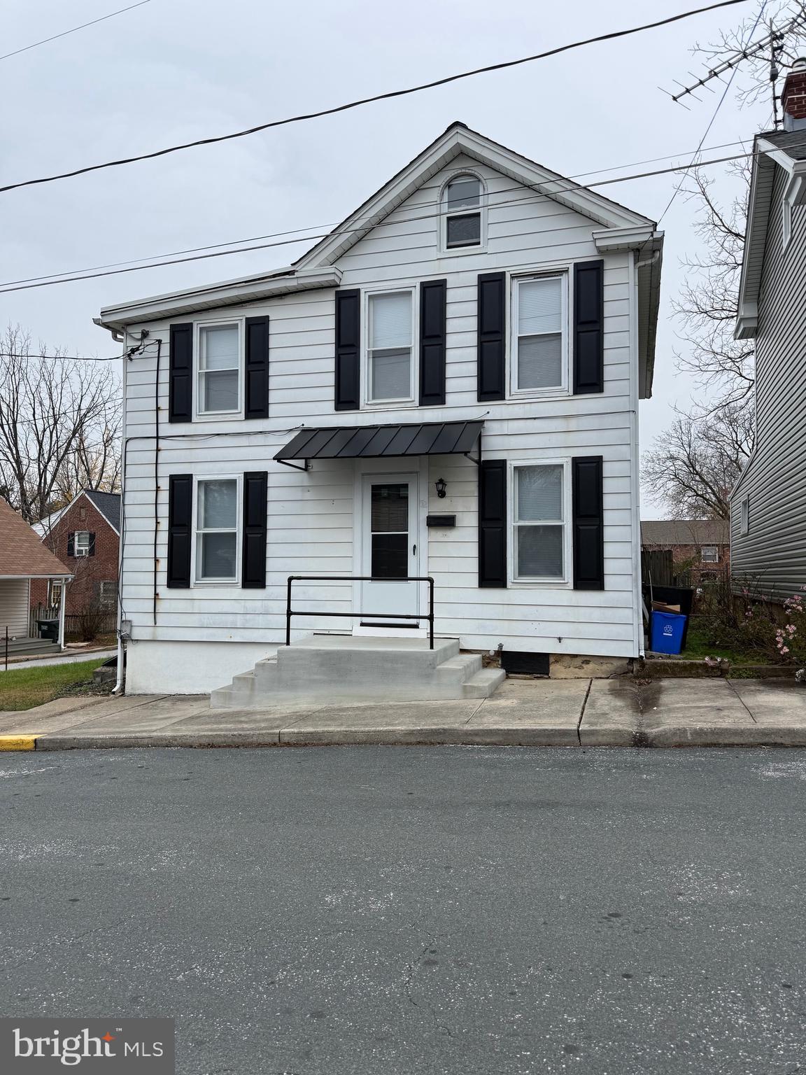 52 West George Street Westminster, MD 21157 - Photo 1 of 34 a front view of a house with a street
