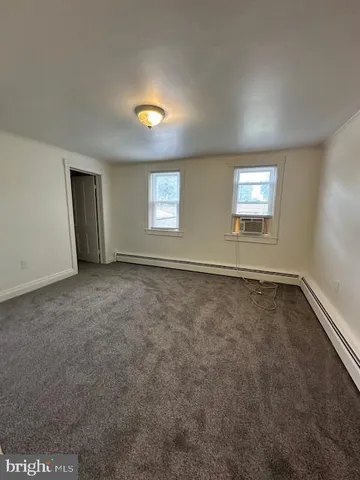 a view of entryway with white walls