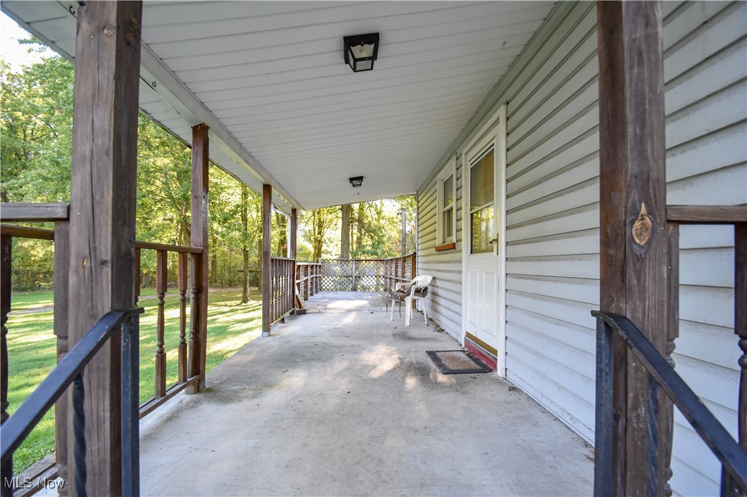 5382 West Webb Road Youngstown, OH 44515 - Photo 10 of 50 View of patio / terrace with covered porch