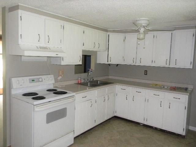 26 Keith Street Chelsea, ME 04330 - Photo 2 of 25 Spacious kitchen with pass through...