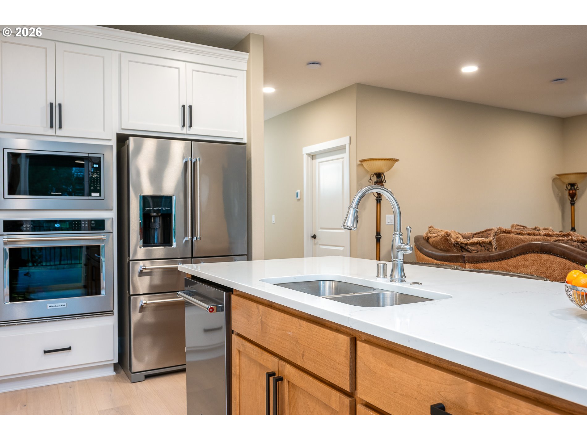 Undisclosed Address Ridgefield, WA 98642 - Photo 13 of 46 a kitchen with stainless steel appliances granite countertop a sink and a refrigerator