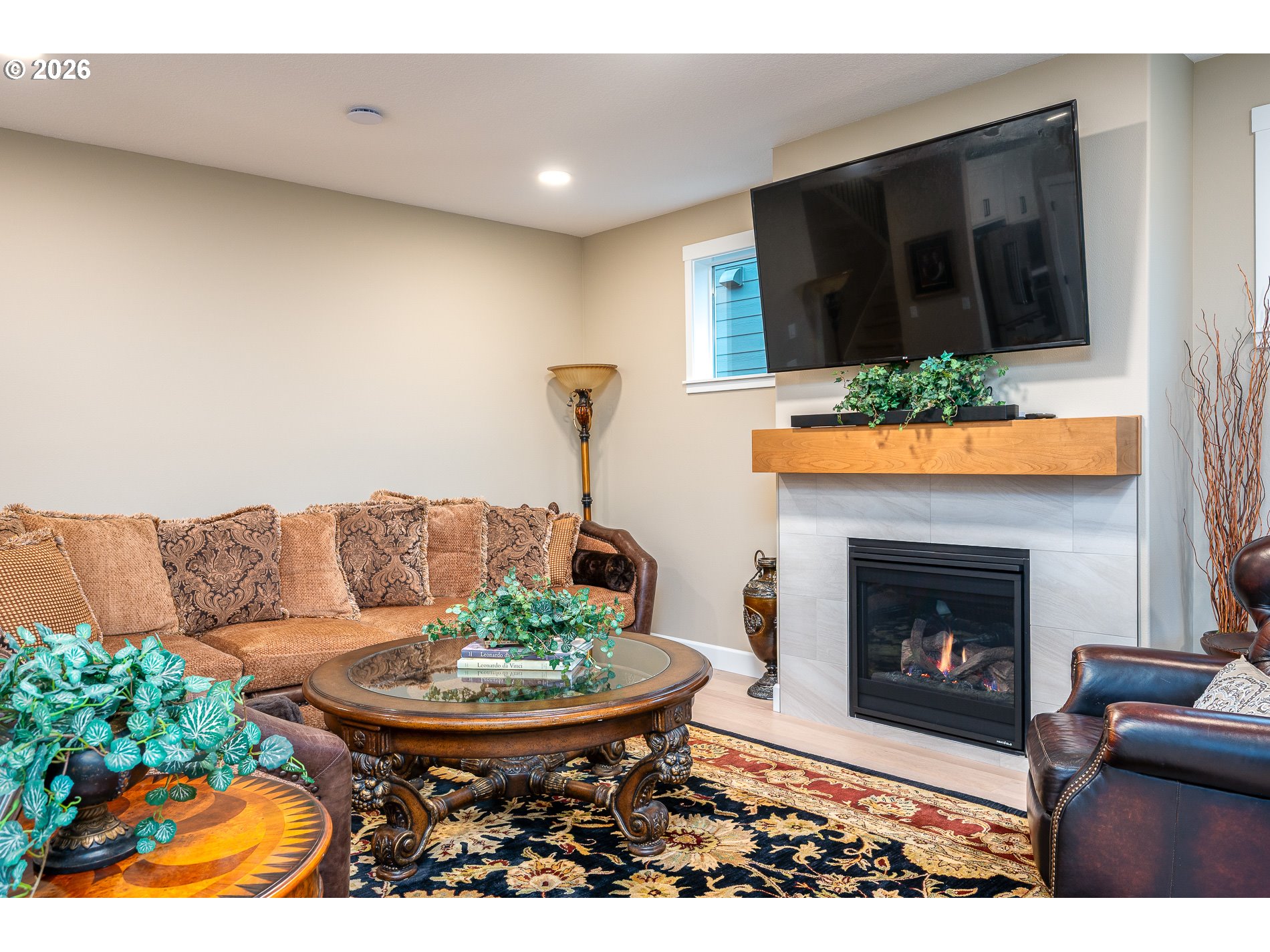 Undisclosed Address Ridgefield, WA 98642 - Photo 17 of 46 a living room with furniture and a fireplace