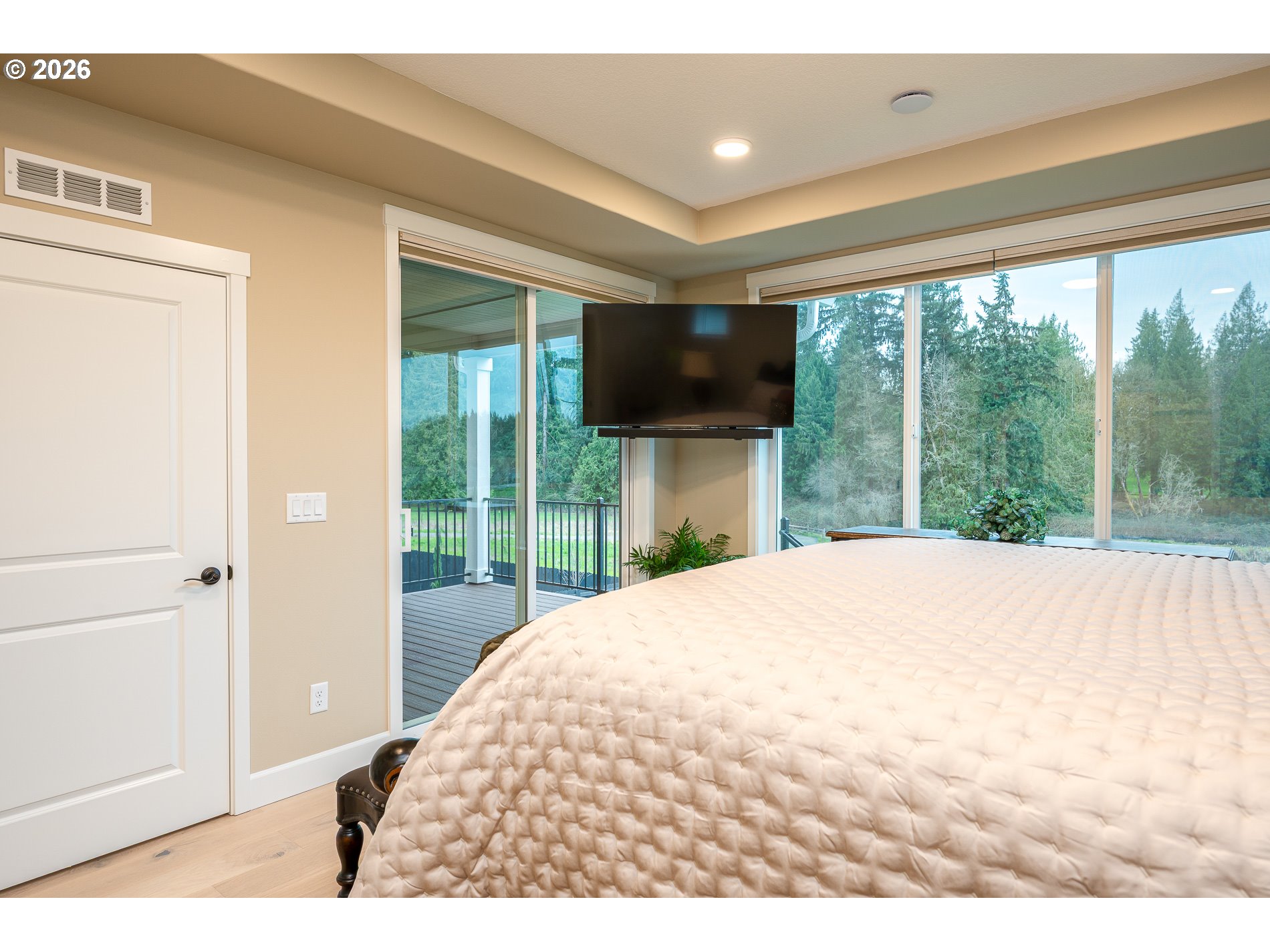 Undisclosed Address Ridgefield, WA 98642 - Photo 22 of 46 a bedroom with a bed and a large window