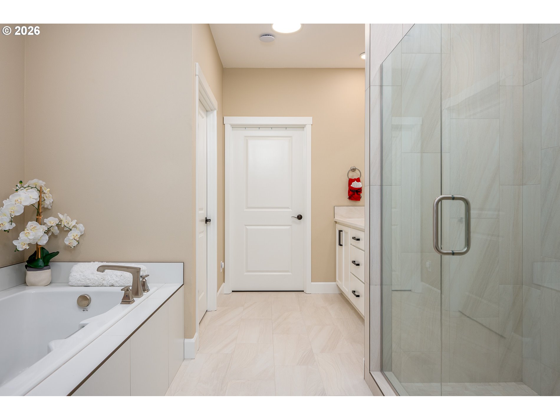 Undisclosed Address Ridgefield, WA 98642 - Photo 24 of 46 a bathroom with a tub sink and mirror