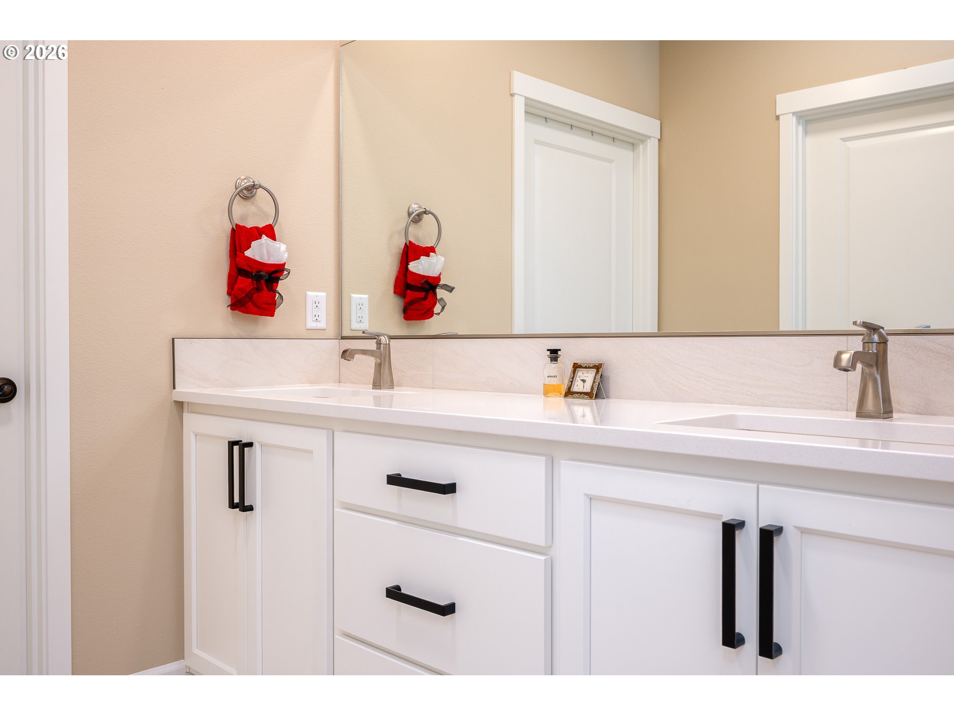 Undisclosed Address Ridgefield, WA 98642 - Photo 26 of 46 a bathroom with a sink vanity and mirror