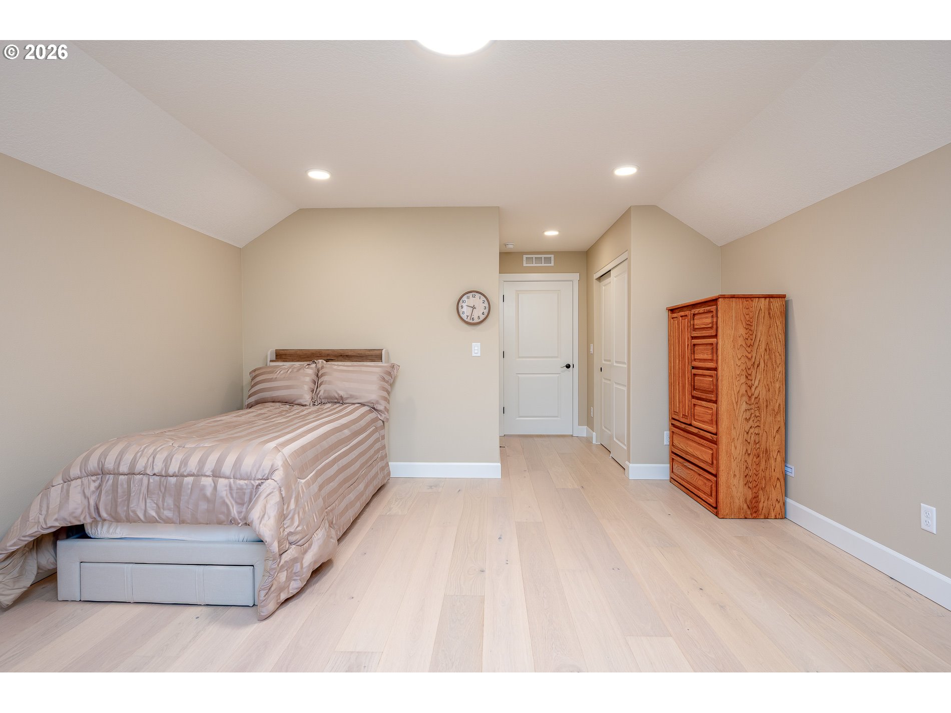 Undisclosed Address Ridgefield, WA 98642 - Photo 33 of 46 a bedroom with a bed and a walk in closet