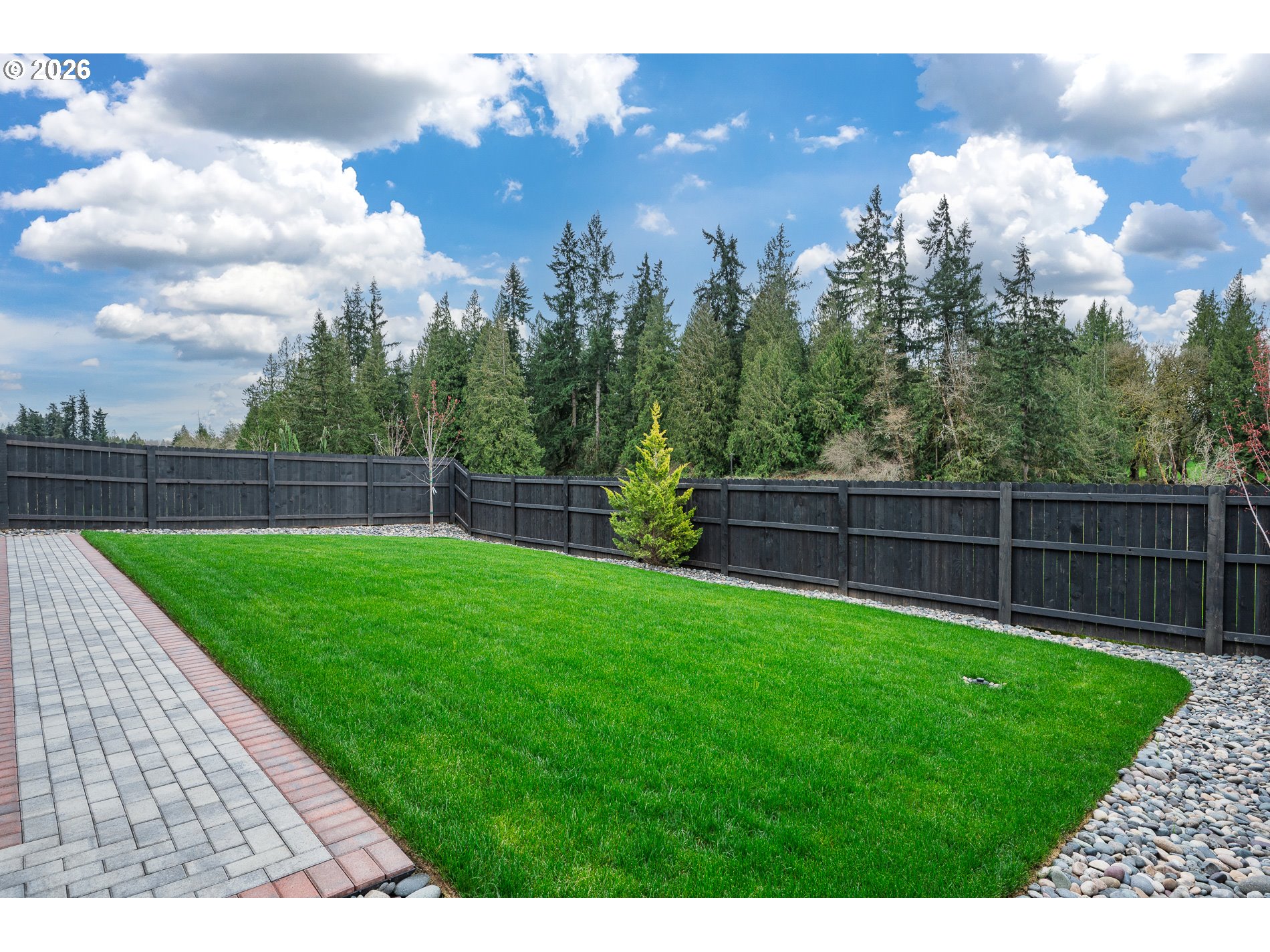 Undisclosed Address Ridgefield, WA 98642 - Photo 38 of 46 a view of a backyard with a garden