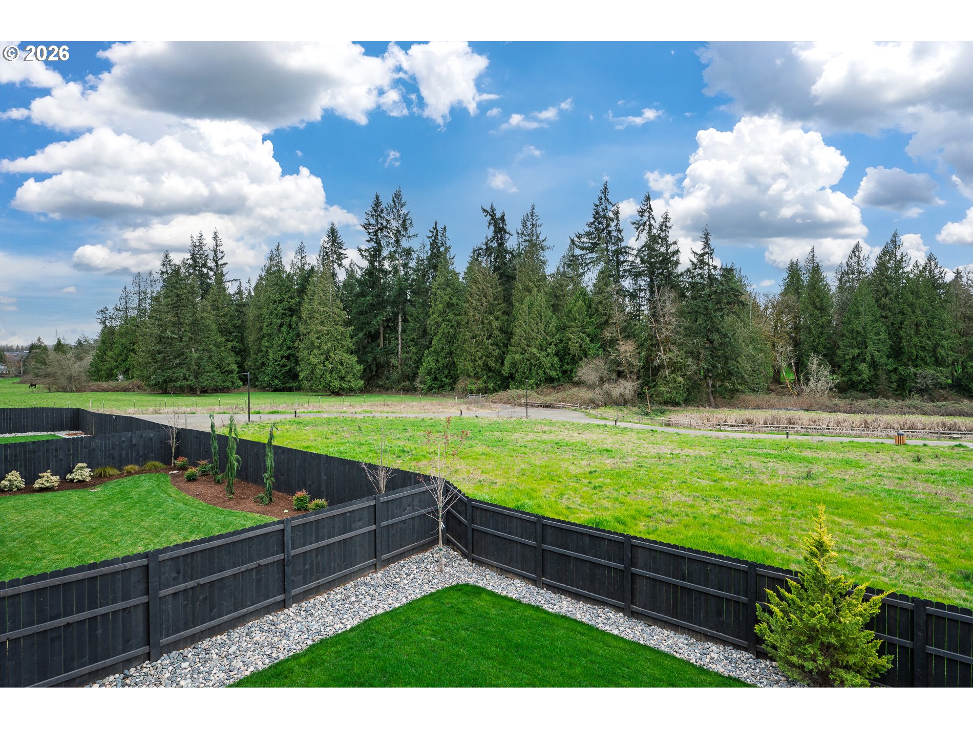 Undisclosed Address Ridgefield, WA 98642 - Photo 39 of 46 a view of a bench and trees in the background